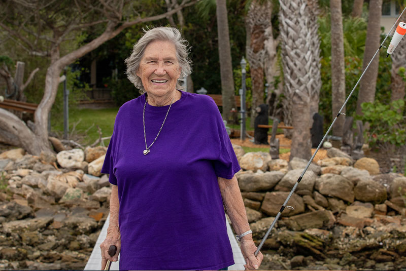 patient smiling outside f the dental practice