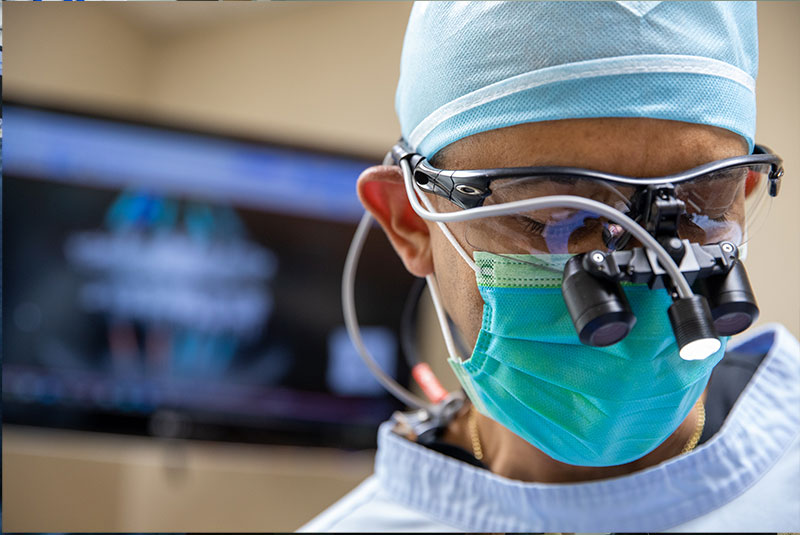 doctor performing guided implant surgery